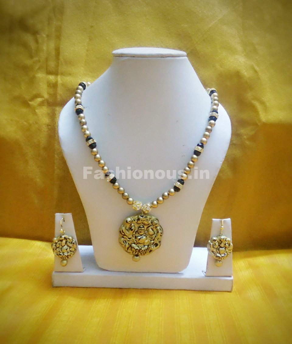 Antique Lakshmi Pendant with Golden and Black Beaded Long Polymer Clay Jewellery Set