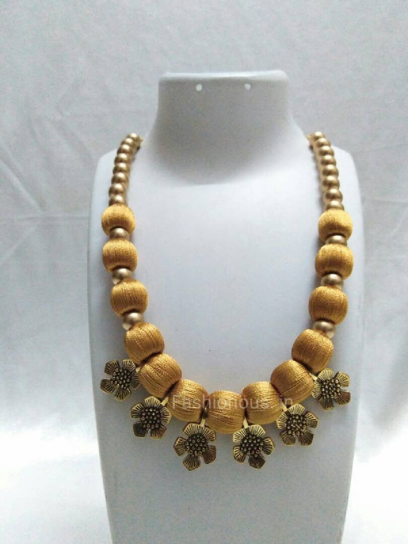 Gold colour flower charms necklace