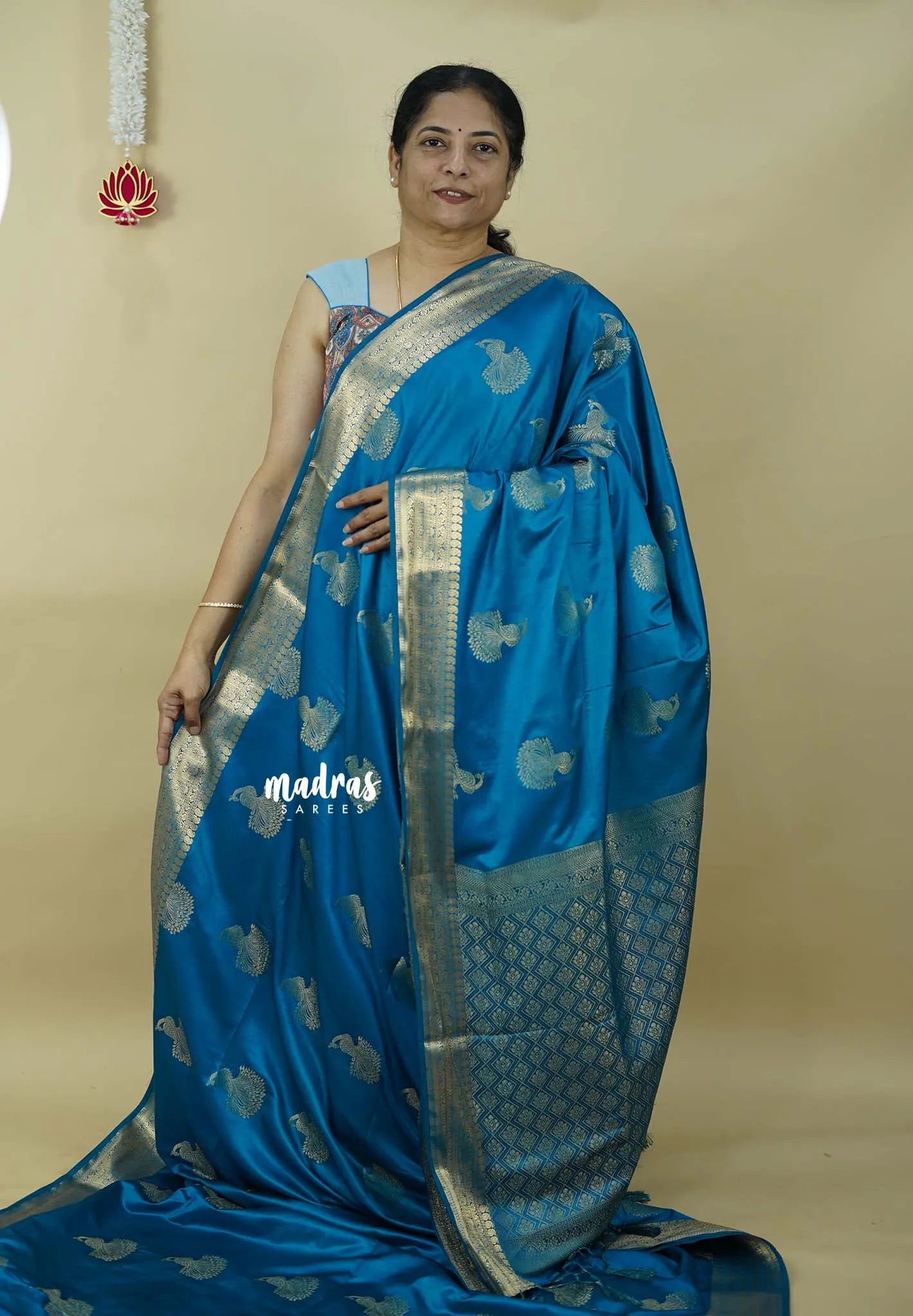 Teal Blue - Sri valli  satin silk Cotton Saree with peacock buttas and gold zari border