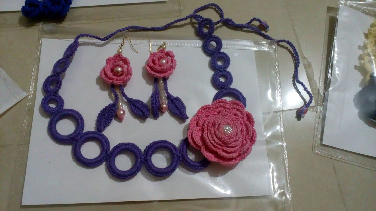 Tribal Crochet Jewellery Set in Violet Circular Loops and Pink Color Floral Design at Center with Earring Sets Set
